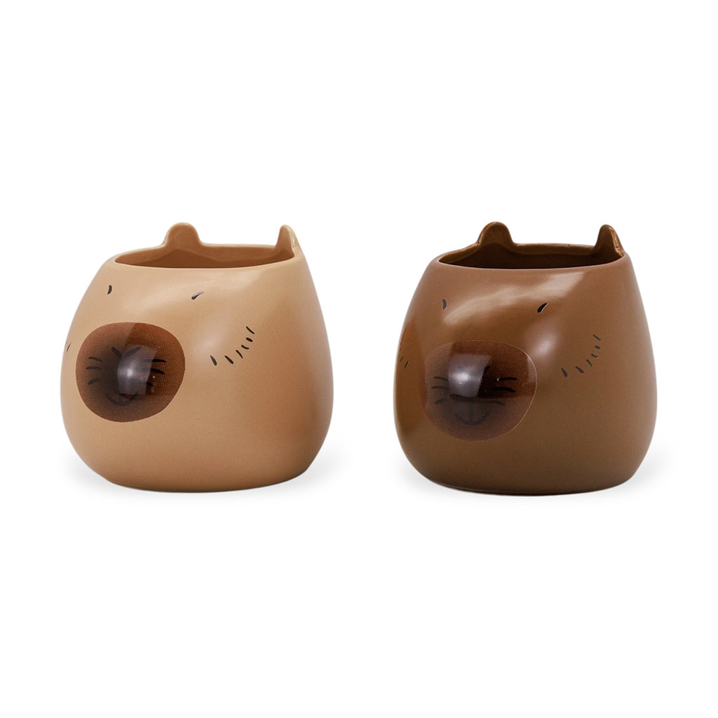 Capybara-shaped ceramic mug.
